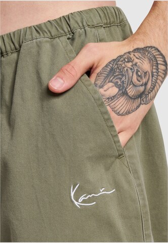 Loosefit Pantalon Karl Kani en vert