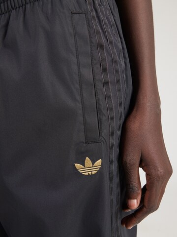 ADIDAS ORIGINALS Loose fit Trousers in Black