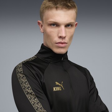 T-Shirt fonctionnel 'King Touch' PUMA en noir