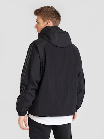 ADIDAS ORIGINALS - Chaqueta de entretiempo en negro