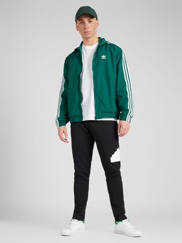 ADIDAS ORIGINALS Kurtka przejściowa w kolorze zielony