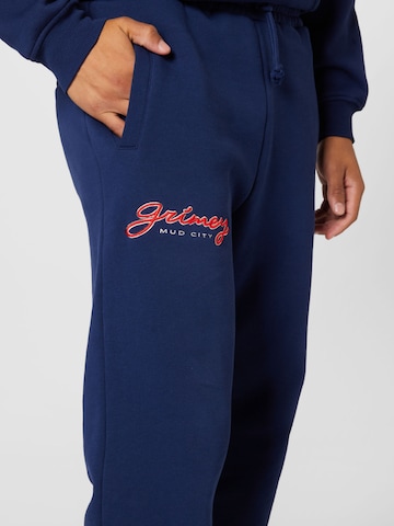 Grimey Tapered Hose 'DUST STORM' in Blau