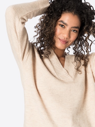 Pull-over 'Cora' ABOUT YOU en beige
