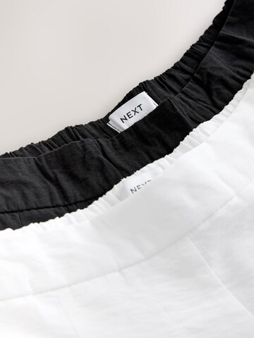 Wide leg Pantaloni di Next in nero