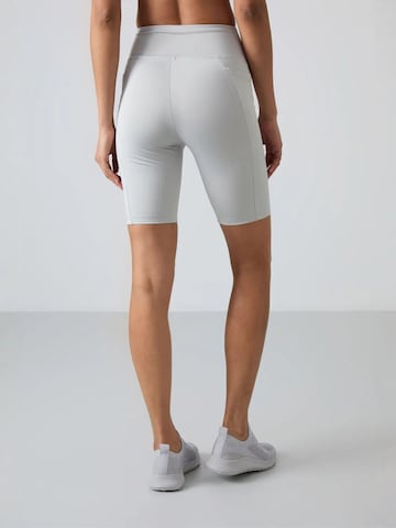 Tommy Life - Tapered Leggings 'Gamaschen' em castanho