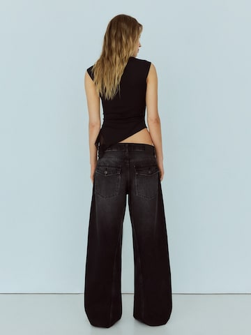 Barrel Jeans di Bershka in nero