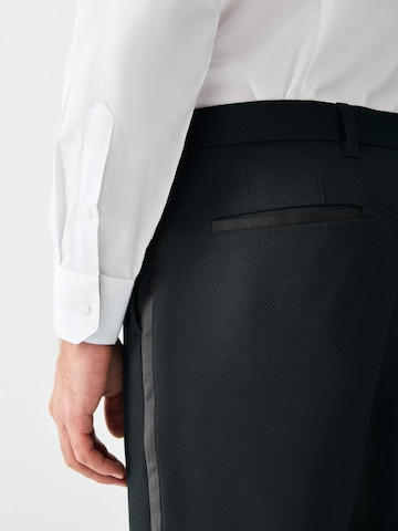 Next - regular Pantalón en negro