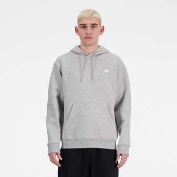 Sweat-shirt new balance en gris : devant