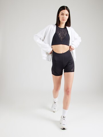 Reebok Спортивный топ в Черный