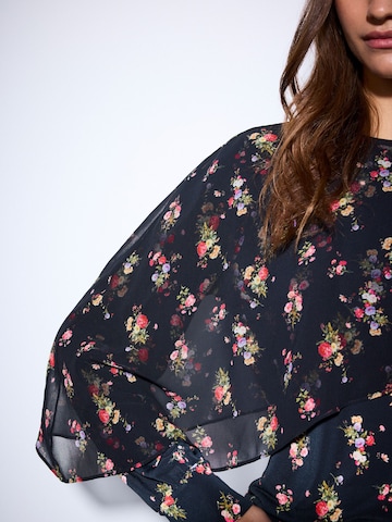 Next - Blusa en negro