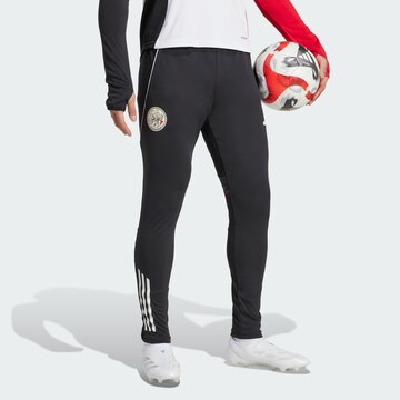 Coupe slim Pantalon de sport 'Ajax Tiro 25 Competition' ADIDAS PERFORMANCE en noir : devant