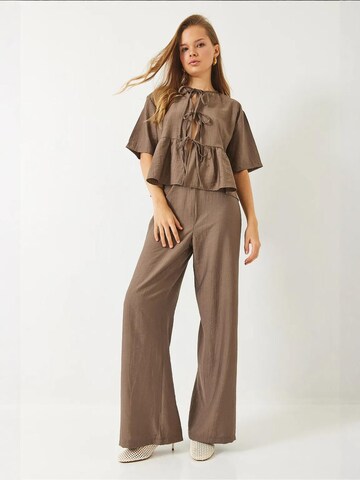 Bianco Lucci - Calças de fato em castanho: frente