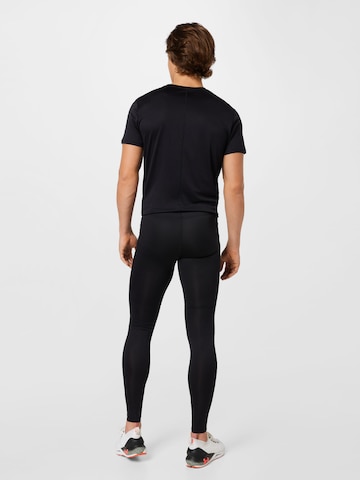 ASICS Skinny Spodnie sportowe 'Core' w kolorze czarny
