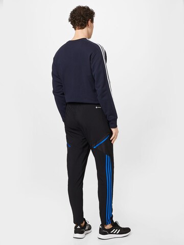 ADIDAS SPORTSWEAR Tapered Urheiluhousut 'Manchester United Presentation' värissä musta