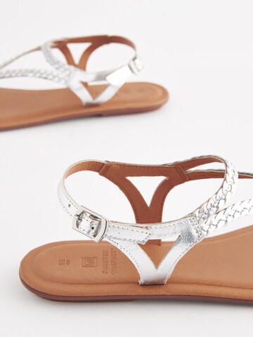 Tongs Next en argent