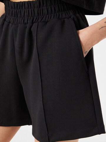 Wide leg Pantaloni sportivi 'Jacey' di Athlecia in nero