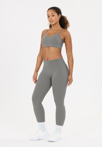 Athlecia Skinny Sports trousers 'Emarri' in Grey: front