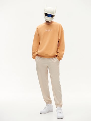 Smiles Sweatshirt 'Milo' i orange