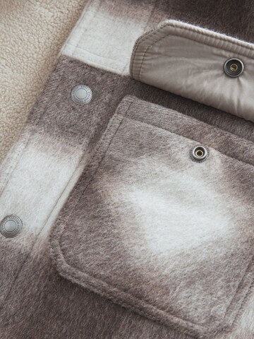 Next Tussenjas in Beige