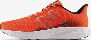 Chaussure de course new balance en orange