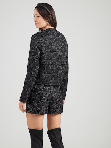 ABOUT YOU - Chaqueta de entretiempo 'Caya' en negro