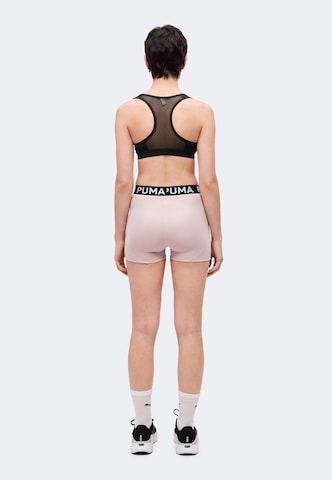 PUMASkinny Sportske hlače 'Strong 3' - roza boja
