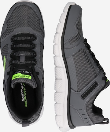 SKECHERS Matalavartiset tennarit värissä harmaa