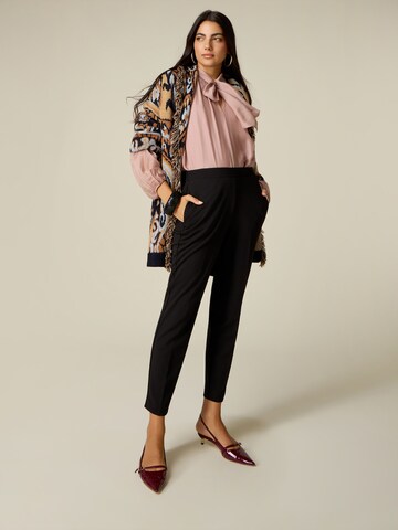 oltre - Skinny Pantalón en negro