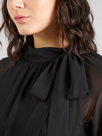 Tuta jumpsuit di SWING in nero