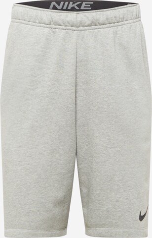 Regular Pantalon de sport NIKE en gris : devant