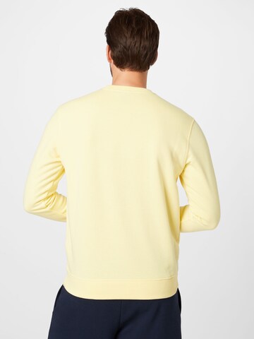 Champion Authentic Athletic Apparel Sweatshirt in Yellow