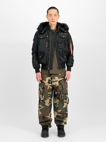 ALPHA INDUSTRIES Between-Season Jacket 'Deflector' in Black: front