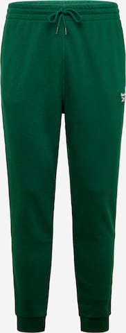 Tapered Pantaloni sport 'IDENTITY' de la Reebok pe verde: față