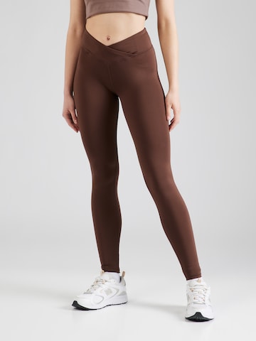 Skinny Pantalon de sport HKMX en marron : devant