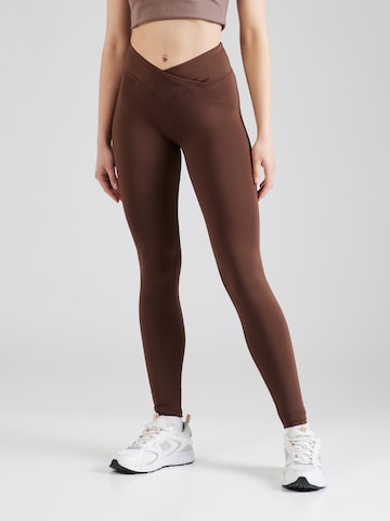 Skinny Pantaloni sport de la HKMX pe maro: față