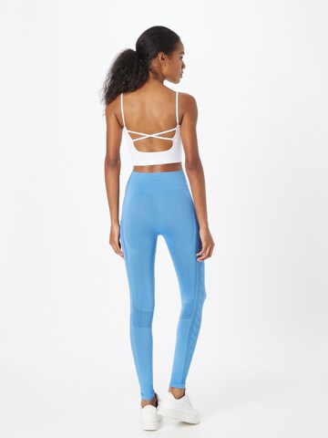 Skinny Pantaloni sport de la Hummel pe albastru