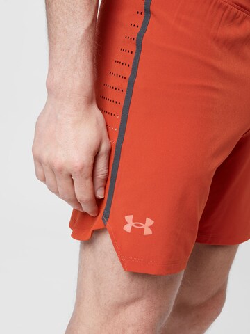 UNDER ARMOUR - regular Pantalón deportivo 'SpeedPocket' en naranja