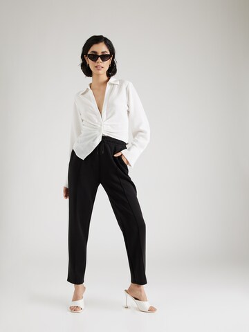 s.Oliver Tapered Broek in Zwart