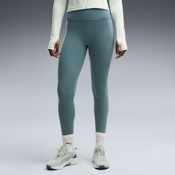 PUMA Skinny Sports trousers in Green: front