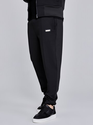 Loosefit Pantaloni di SikSilk in nero: frontale
