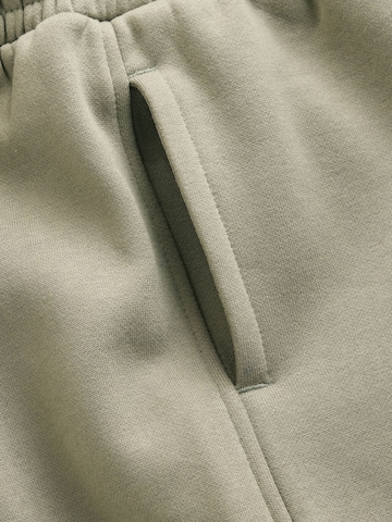 Next Joggingdragt i grøn