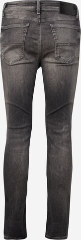 Tommy Jeans Skinny Jeans 'SIMON' in Blauw