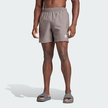 ADIDAS ORIGINALS Board Shorts 'Essentials Solid' in Brown: front