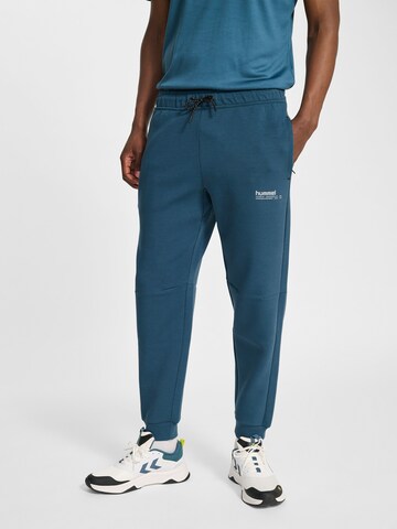 Hummel Tapered Sportbroek 'Tech Fleece' in Blauw: voorkant