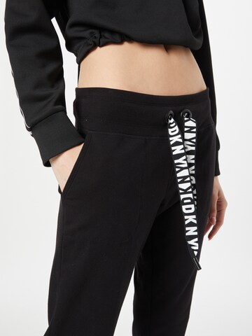 Effilé Pantalon de sport DKNY Performance en noir