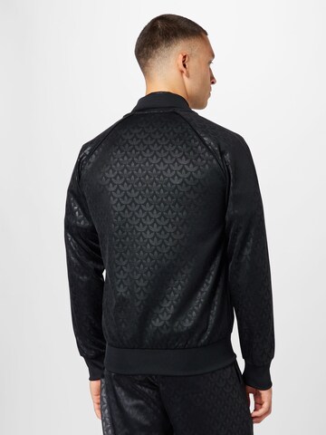 Veste de survêtement 'Graphics Monogram Sst' ADIDAS ORIGINALS en noir
