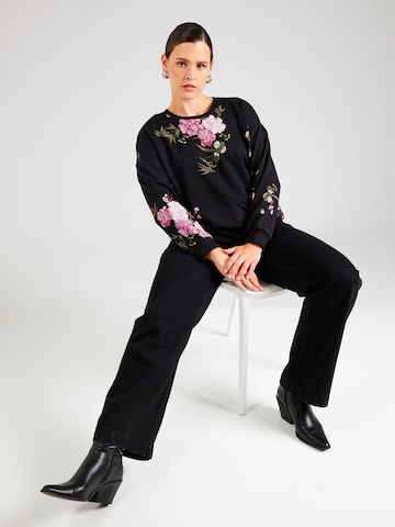 Sweat-shirt 'CARWANTED' ONLY Carmakoma en noir