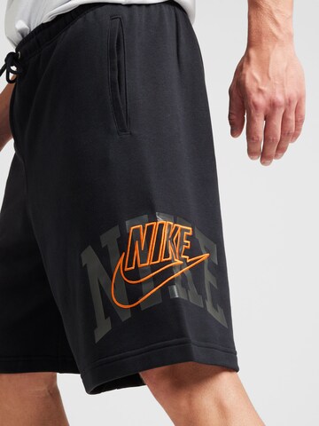 Nike Sportswear Loose fit Sports trousers 'CLUB' in Black