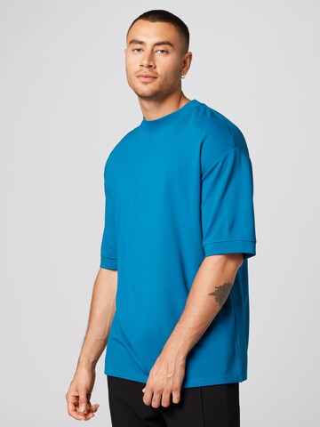 ABOUT YOU x Kevin Trapp Koszulka 'Chris' w kolorze niebieski: przód