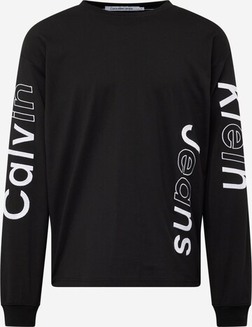 T-Shirt Calvin Klein Jeans en noir : devant